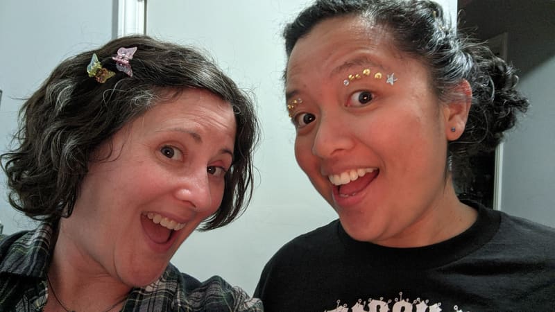 Holly and Rosalie with sparkles around their eyes